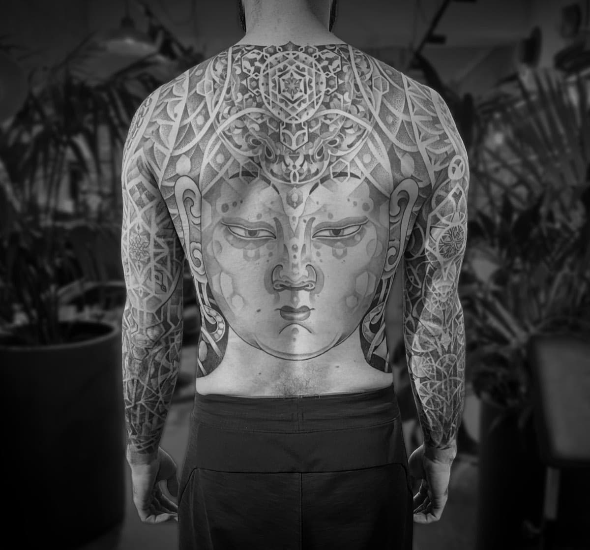 Full back sacred geometry tattoo with sleeves